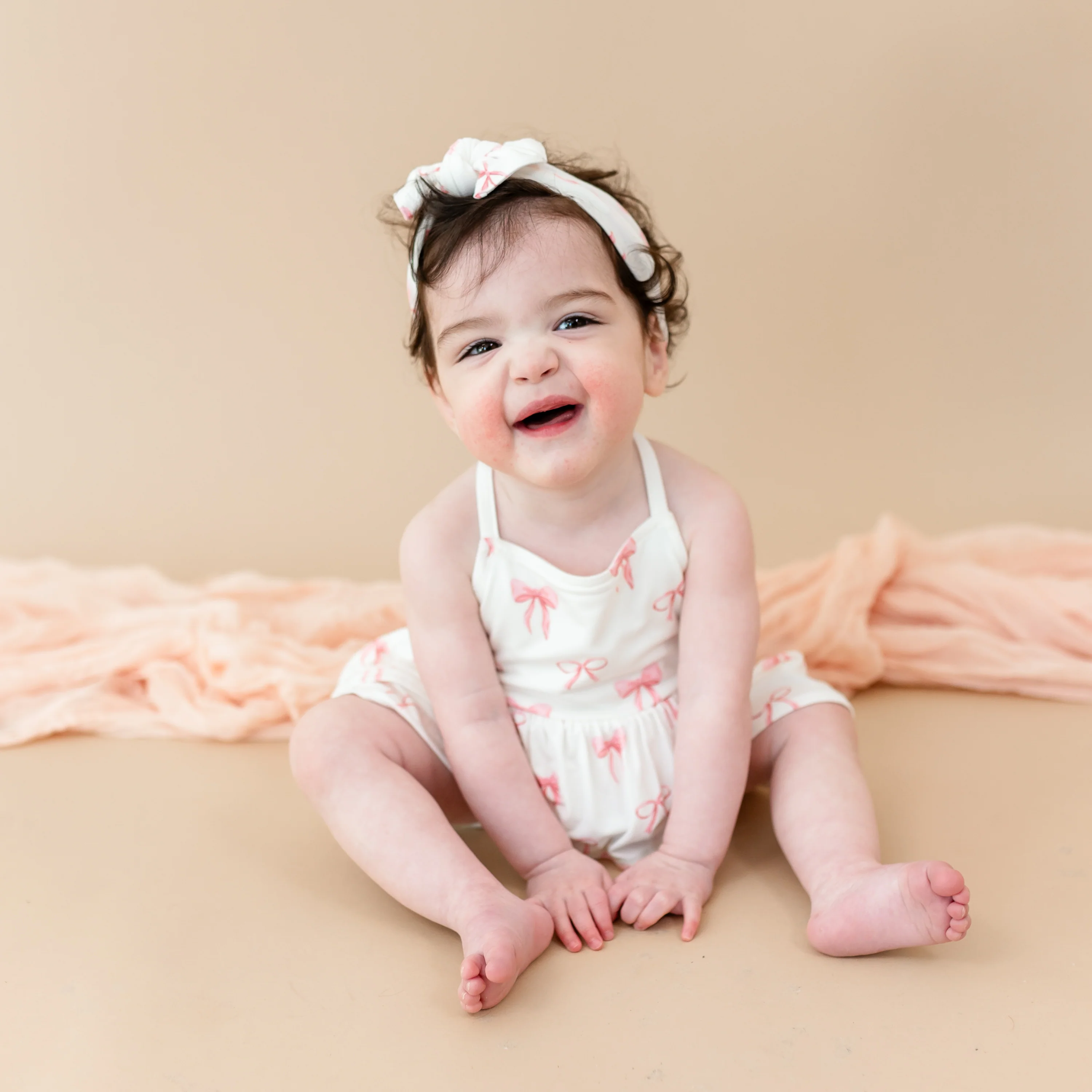 Spaghetti Strap Ruffle Romper in Bow